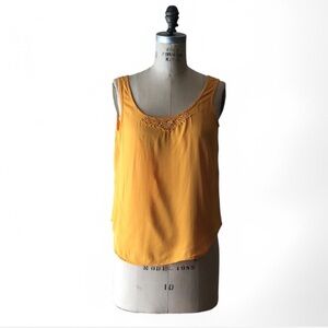 Vibrant Yellow Tank Top with Scooped Neckline and Flowy Fit